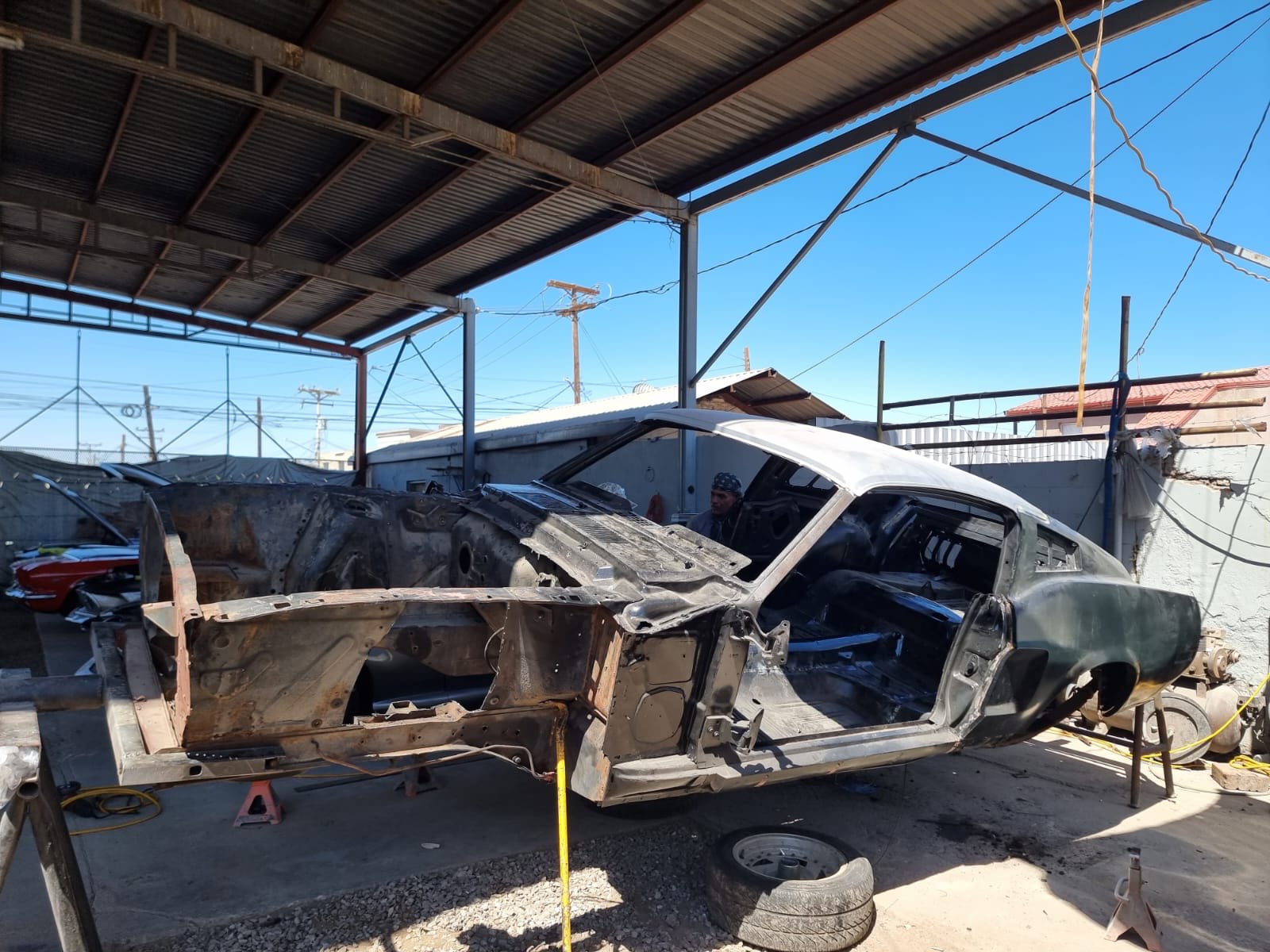 Mustang frame stripped bare